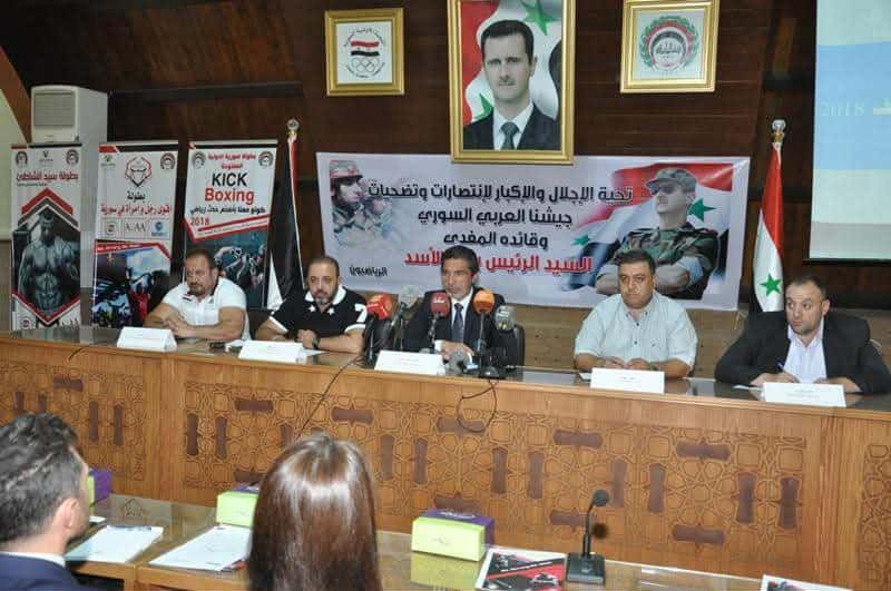 ماجد الركبي متحدثا في إحدى الفعاليات التي نظمها دعما لنظام بشار الأسد وجيشه